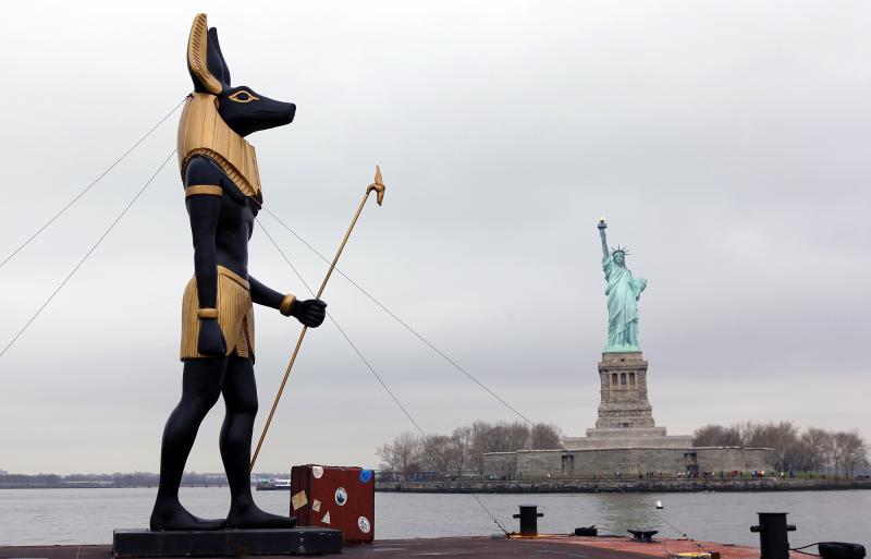 anthro duo male new_york photo real sculpture standing statue suitcase was_scepter what unknown_artist egyptian_mythology middle_eastern_mythology mythology real_world anubis statue_of_liberty anubian_jackal canid canine canis deity jackal mammal grandfathered_content sculpture_(artwork) traditional_media_(artwork)