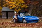 anthro car convertible fur green_hair green_nose hair looking_at_viewer male motor_vehicle nude photo_background smile solo standing vehicle kappy mazda mazda_miata mazda_mx-5 mammal mustelid otter photography_(artwork)