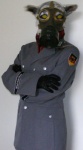 anthro black_clothing black_handwear button_(fastener) clothed clothing coat costume crossed_arms fingers fully_clothed fursuit gas_mask german gloves grey_outerwear handwear inner_ear_fluff kerchief male mask plaid real simple_background solo topwear trenchcoat tuft uniform white_background yellow_eyes unknown_artist canid canine canis mammal wolf grandfathered_content half-length_portrait hi_res portrait