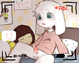 anthro balls bed bedding biped blanket blue_eyes blush bodily_fluids bottomless camera_view clothed clothing cum cum_on_penis erection furniture genital_fluids genitals male open_mouth penis pillow plushie recording shirt sitting small_penis smiley_face solo tapering_penis topwear young young_anthro young_human young_male pinknuss undertale undertale_(series) asriel_dreemurr chara_(undertale) frisk_(undertale) boss_monster_(undertale) bovid caprine goat human mammal 5:4 archived_source