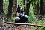 claws cosplay detailed_background fake_ears fake_pokemon_ears female forest nature outside plant real solo tree wood unknown_artist nintendo pokemon generation_3_pokemon human mammal mightyena pokemon_(species) grandfathered_content