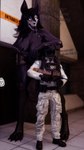 anthro armor bodily_fluids breasts duo female gun larger_female male male/female ranged_weapon saliva saliva_string size_difference tongue tongue_out weapon heresy_sfm scp_foundation scp-1471-a human mammal monster 3d_(artwork) 9:16 digital_media_(artwork) distracting_watermark hi_res watermark