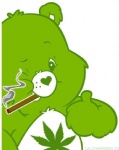 ambiguous_gender anthro belly belly_markings border cigarette drugs fur gesture green_body green_fur hand_gesture heart_nose heart_symbol marijuana marijuana_leaf markings one_eye_closed simple_background smoke smoking solo thumbs_up tuft white_background white_border wink unknown_artist care_bears bear mammal