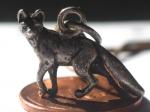 ambiguous_gender feral jewelry metal necklace pendant penny_(coin) real solo unknown_artist canid canine fox mammal 2013 4:3 grandfathered_content hi_res photography_(artwork)