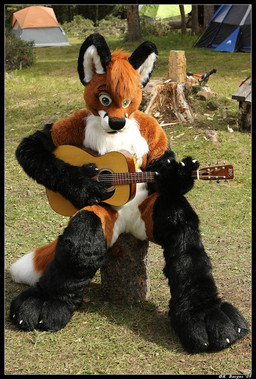 acoustic_guitar anthro biped brown_hair camping clothing costume detailed_background forest fursuit green_eyes guitar hair male musical_instrument outside plant playing_guitar playing_music plucked_string_instrument real sitting solo string_instrument tent tree wood unknown_artist lucifur canid canine fox mammal grandfathered_content photography_(artwork)