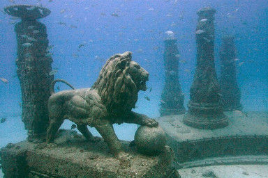 blue_background column feral looking_away male real rock scenery sculpture sharp_teeth simple_background solo statue swimming teeth underwater water unknown_artist ambient_fish ambient_sealife aquatic felid fish lion mammal pantherine grandfathered_content sculpture_(artwork) traditional_media_(artwork)