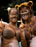 bikini bodypaint clothed clothing duo female painted_markings real skimpy swimwear two-piece_swimsuit unknown_artist louisiana_state_university felid human mammal pantherine tiger