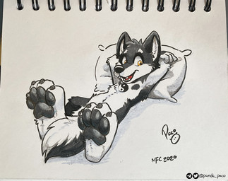 anthro black_body black_fur black_nose brown_pawpads claws fangs fur glistening glistening_eyes head_tuft looking_at_viewer lying male nude on_back open_mouth open_smile orange_eyes pawpads pillow smile solo teeth toe_claws tuft white_body white_fur young young_anthro young_male pandapaco canid canine mammal 2020 dated