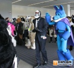 anthro clothing cosplay costume fursuit group knife male real weapon unknown_artist team_fortress_2 valve spy_(team_fortress_2) canid canine human mammal grandfathered_content low_res