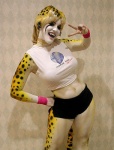 bodypaint clothed clothing female midriff painted_markings real solo unknown_artist cheetah felid feline human mammal low_res