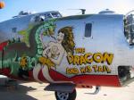 aircraft airplane bomber breasts claws duo female male military nose_art outside real tongue tongue_out vehicle unknown_artist mythology dragon human mammal mythological_creature mythological_scalie scalie 4:3 grandfathered_content hi_res