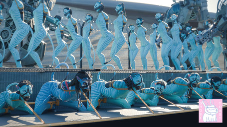 ankles_tied ball_gag barefoot bdsm blue_body blue_skin bondage bound breasts collar crowd cuff_(restraint) defeated enslaved feet female gag gagged group halter hands_behind_back hands_tied harness_ball_gag harness_gag kneeling large_ball_gag leather leather_cuffs nipples nude nude_female nude_humanoid prisoner public public_nudity restraints science_fiction slave small_breasts striped_body striped_skin stripes submissive submissive_female ghostoast james_cameron's_avatar neytiri alien alien_humanoid animal_humanoid felid felid_humanoid feline feline_humanoid humanoid mammal mammal_humanoid na'vi 16:9 2025 3d_(artwork) digital_media_(artwork) hi_res widescreen