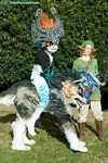 clothing cosplay costume female feral fursuit group male quadsuit real riding beastcub nintendo the_legend_of_zelda twilight_princess link link_(wolf_form) midna canid canine canis human humanoid hylian mammal twili wolf grandfathered_content photography_(artwork)