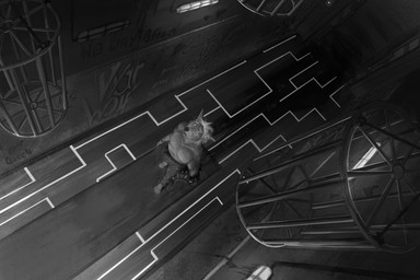 anthro bottomwear cage carpet cigarette city clothed clothing cracked_wall damaged_wall denim denim_bottomwear denim_clothing detailed_background digitigrade door fur glowing graffiti graffiti_on_wall hair high-angle_view holding_object jacket jeans leather leather_clothing leather_jacket leather_topwear male masculine neon neon_lights night open_door pants piercing shadow solo spiked_clothing spiked_jacket spikes stairs tail three-quarter_view topless topwear torn_bottomwear torn_clothing torn_jeans torn_pants walking wire worried vyarwolf canid canine canis mammal wolf 3:2 hi_res monochrome