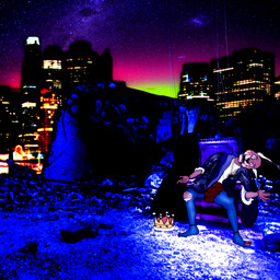 anthro brown_nose city cityscape clothed clothing countershade_ears countershading crown fully_clothed fur headgear inner_ear_fluff looking_at_viewer male open_mouth photo_background puppet rubble sitting solo string tan_body tan_fur torn_clothing tuft fredryk_phox rush_(band) caracal caracal_(genus) felid feline mammal 1:1 2014 archived_source hi_res photography_(artwork)