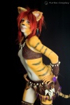 blue_eyes bodypaint clothed clothing cosplay ear_piercing feathers female hair leather painted_markings piercing real red_hair skimpy solo stripes tribal tribal_clothing yurikocosplay felid humanoid mammal pantherine tiger 2:3