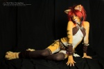 blue_eyes bodypaint clothed clothing cosplay ear_piercing feathers female hair leather painted_markings piercing real red_hair skimpy solo stripes tribal tribal_clothing yurikocosplay felid humanoid mammal pantherine tiger 3:2