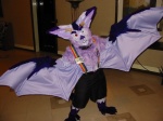 ambiguous_gender anthro badge clothing collar costume fursuit horn looking_at_viewer membrane_(anatomy) membranous_wings rainbow real solo suspenders wings jax_the_bat jax_(jax_the_bat) bat mammal 4:3 grandfathered_content