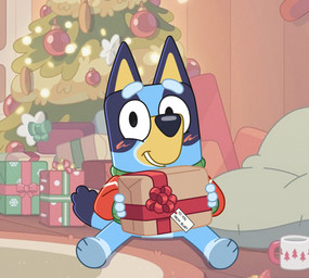 3_fingers 3_toes ambiguous_anthro ambiguous_gender anthro barefoot bean_bag biped black_eyes blue_body blue_ears blue_eyebrows blue_fur blue_tail blush blush_lines bottomless bottomless_anthro bottomless_female box christmas_clothing christmas_decorations christmas_ornament christmas_present christmas_sweater christmas_topwear christmas_tree clothed clothed_anthro clothed_female clothing container cup dipstick_tail eyebrows featureless_crotch feet female fingers floor fur gift gift_box green_clothing green_sweater green_topwear holding_box holding_container holding_object holding_present holidays inside long_sleeves looking_at_viewer markings mug multicolored_body multicolored_clothing multicolored_fur multicolored_sweater multicolored_topwear on_model ornament paws plant pointy_ears prick_ears red_clothing red_sweater red_topwear rug sitting smile smiling_at_viewer solo sweater sweater_only tail tail_markings teeth toes toony topwear topwear_only tree two_tone_body two_tone_fur wall_(structure) white_clothing white_sweater white_topwear wood wood_floor wood_wall yellow_body yellow_fur yellow_inner_ear biocrine bluey_(series) christmas bluey_heeler australian_cattle_dog canid canine canis cattledog domestic_dog herding_dog mammal pastoral_dog 2025 hi_res female_(lore)
